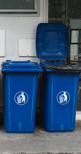 istock Garbage Trash Bins for collecting a recycle materials. Garbage trash bins for waste segregation. Separate waste collection food waste, plastic, paper and danger waste. Recycling. Environment. 1197312361