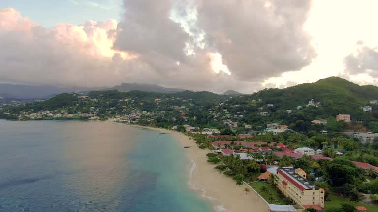 Slow aerial view of the coast of Grenada island