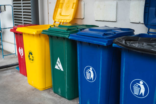 istock Garbage Trash Bins for collecting a recycle materials. Garbage trash bins for waste segregation. Separate waste collection food waste, plastic, paper and danger waste. Recycling. Environment. 1197313932
