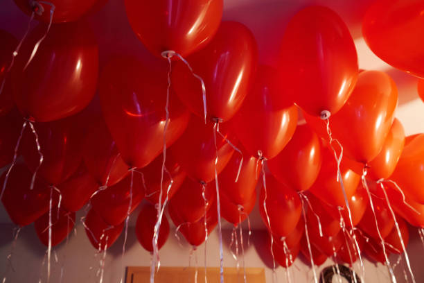 istock group of red heart shaped balloons 1197316473