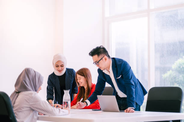 istock Group of Multiracial People Having a Discussion During Meeting 1197320495