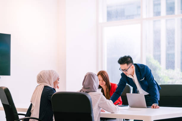 istock Group of Multiracial People Having a Discussion During Meeting 1197320514