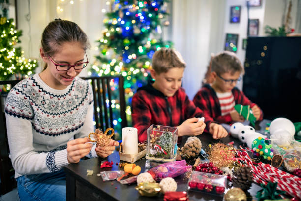 istock Family crafting Christmas decorations 1197321815