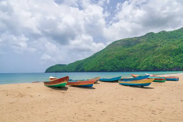 Old fisherman boats on the beach at the day,Samana beach,Dominican Republic.