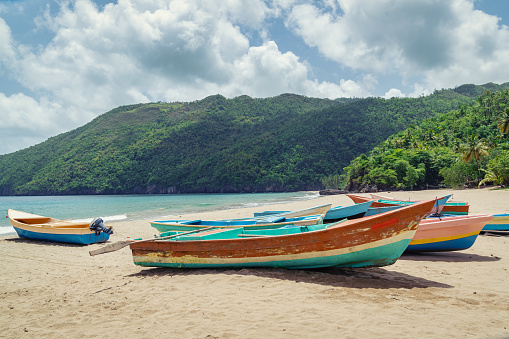 Old fisherman boats on the beach at the day,Samana beach,Dominican Republic.