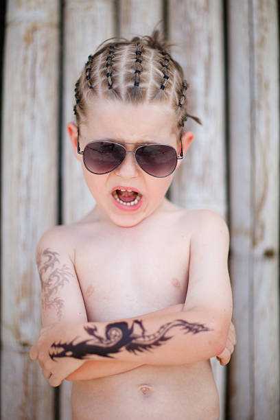 retrato de niño - anger child braids braided fotografías e imágenes de stock