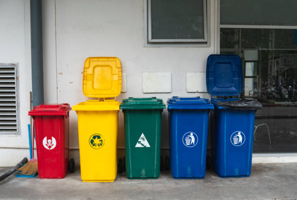 istock Garbage Trash Bins for collecting a recycle materials. Garbage trash bins for waste segregation. Separate waste collection food waste, plastic, paper and danger waste. Recycling. Environment. 1197323791