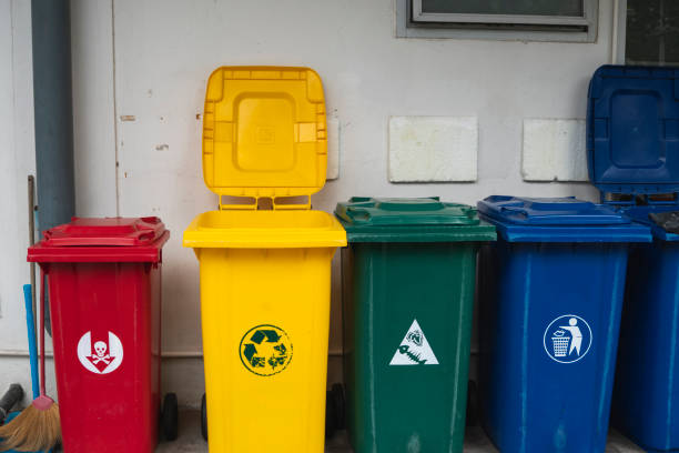 istock Garbage Trash Bins for collecting a recycle materials. Garbage trash bins for waste segregation. Separate waste collection food waste, plastic, paper and danger waste. Recycling. Environment. 1197327165