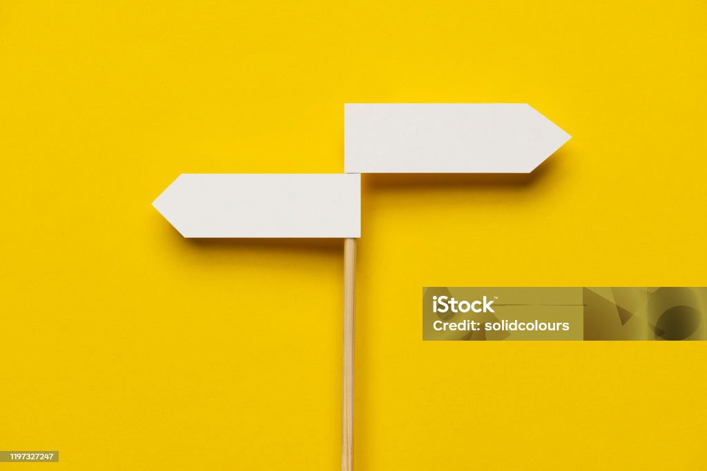 Two Way Two directional sign on the yellow background. Choice Stock Photo