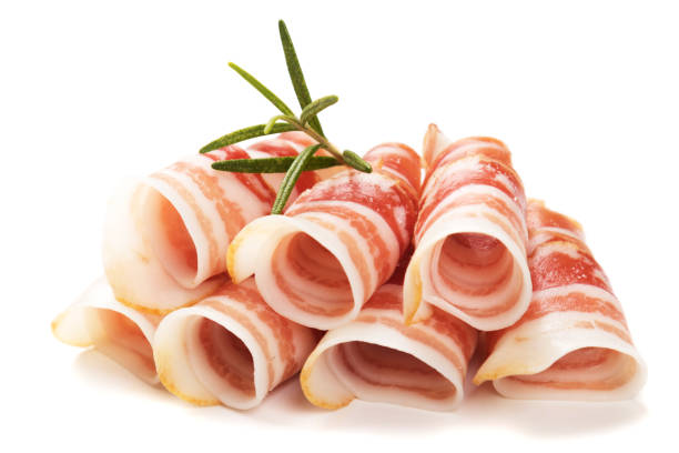 rollos de tocino panceta aislados en blanco - pancetta fotografías e imágenes de stock