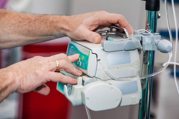 istock Anesthetist at a operating room setting the anesthesia machine 1197332897