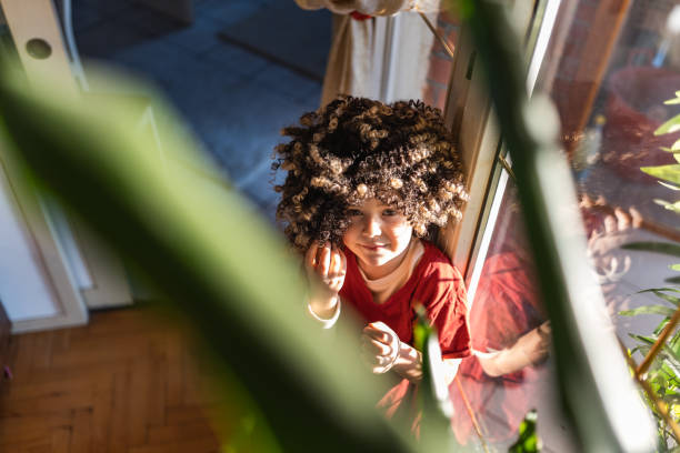 istock Funny child wearing wig 1197332955