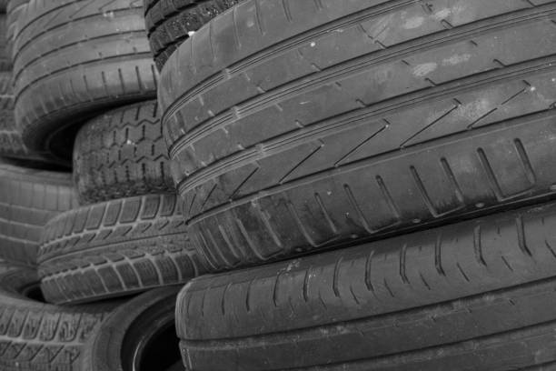 istock Pile of old used worn car tires 1197333684