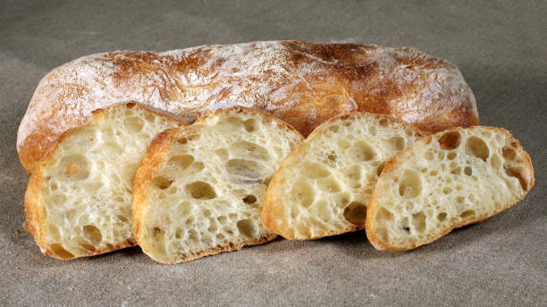 istock cut the bread on the table. Cereal food 1197335074