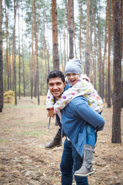 istock Dad and daughter are resting in the woods. 1197335943