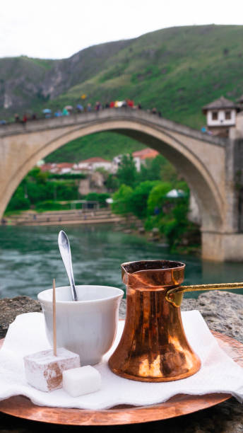 istock Traditional Turkish coffee in front of Old bridge in Mostar. 1197339530