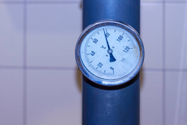 istock Temperature sensor is analog on chimney heating of an industrial building. 1197342687