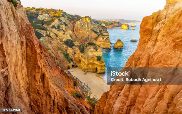Beautiful Camilo Beach In Lagos Portugal With Its Rock Cliffs And Blue Ocean Stock Photo - Download Image Now