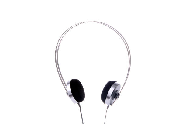 istock Silver headphones with cable isolated on white background. 1197345233