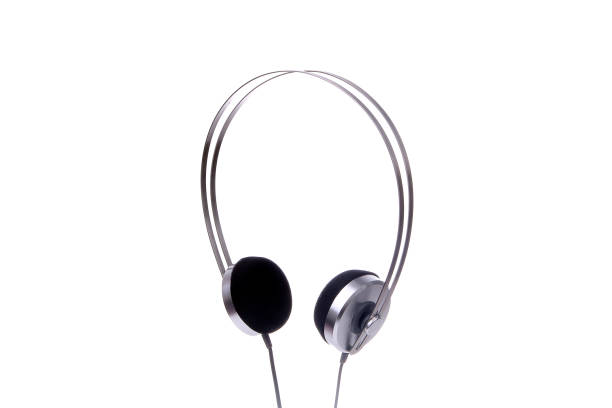 istock Silver headphones with cable isolated on white background. 1197345237