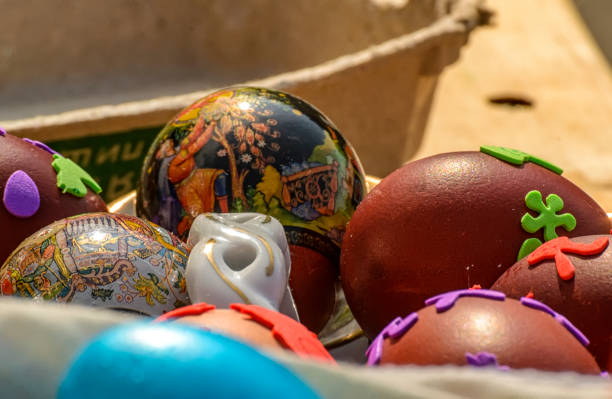 istock Easter eggs and cakes on lighting near the temple. 1197348376