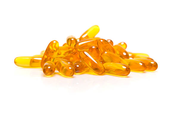 рыбий жир - fish oil coq10 vitamin e cod liver oil стоковые фото и изображения