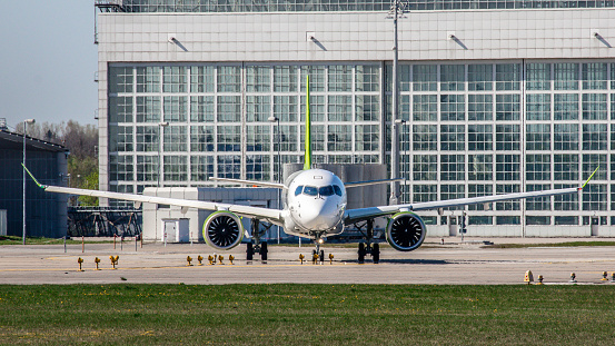 Munich, Germany - April 23, 2019: An Airbus A220-300 from Air Baltic gets ready to take off at Munich Airport. The aircraft with registration YL-AAO has been in service since March 2019 for the Latvian airline.