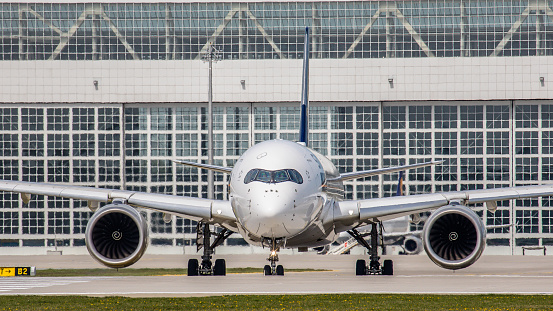 Munich, Germany - April 23, 2019: An Airbus A350-941 from Singapore Airlines is getting ready for takeoff at Munich Airport. The aircraft with registration 9V-SMO has been in service for the Singapore Airlines since June 2017.