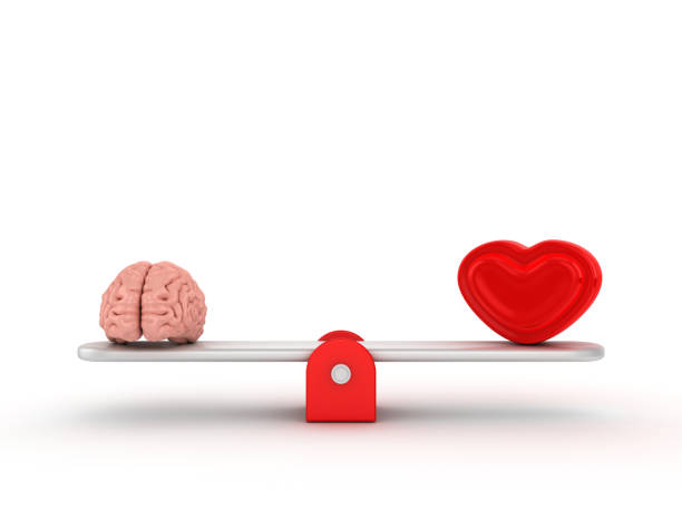 istock Seesaw Scale with Human Brains and Heart - 3D Rendering 1197364906