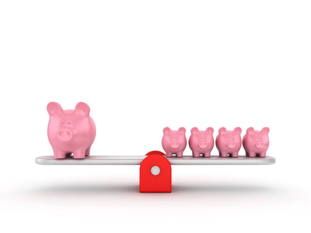 istock Seesaw Scale with Piggy Banks - 3D Rendering 1197365645