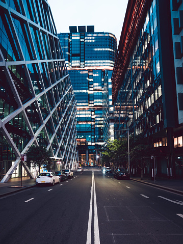 Street view surrounded with commercial office buildings in a city . Commercial real estate, finance and business.