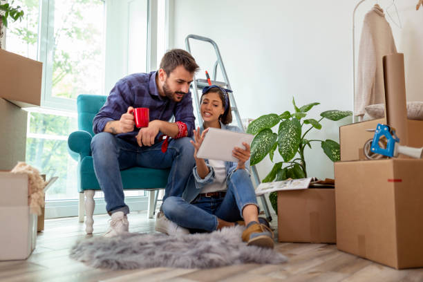 istock Couple looking for home redecoration ideas 1197369507