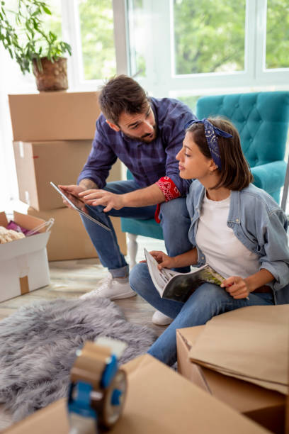 istock Couple moving in new home 1197369542