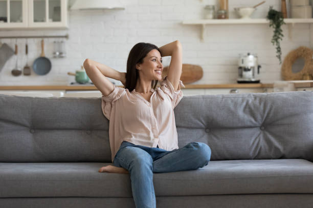 istock Young peaceful lady enjoying lazy weekend alone. 1197373081