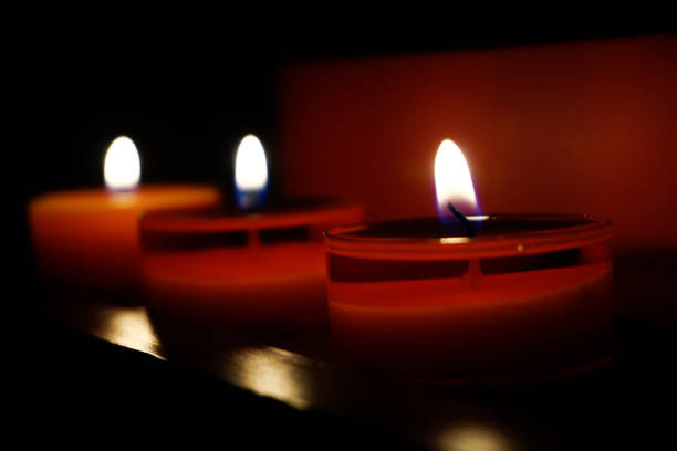istock Candles in the dark 1197387160