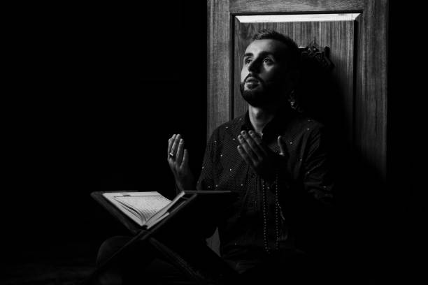 istock Muslim Man Reading Holy Islamic Book Koran 1197387222