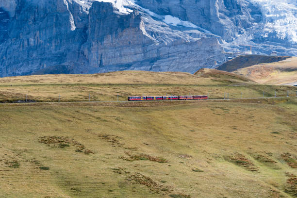 istock Scenic Swiss Alps an red train 4 1197389284