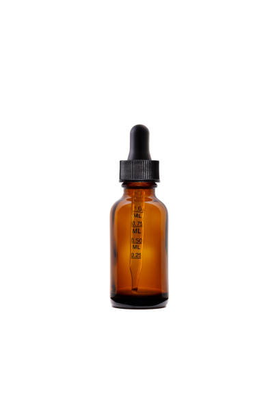 istock Blank tincture bottle for liquid supplement with pipette or dropper on white background 1197390340