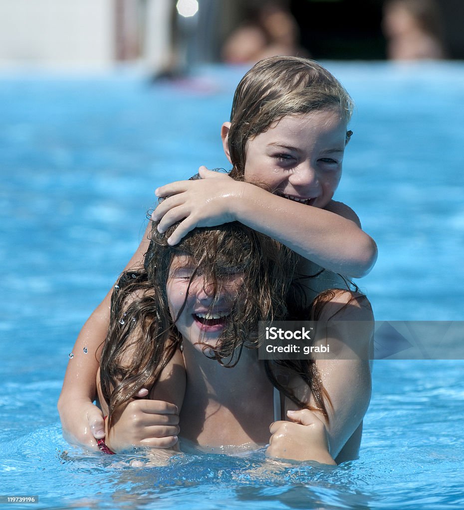 Divertimento in piscina - Foto stock royalty-free di Acqua