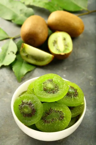 Healthy and delicious dry kiwi fruits served in bowl.