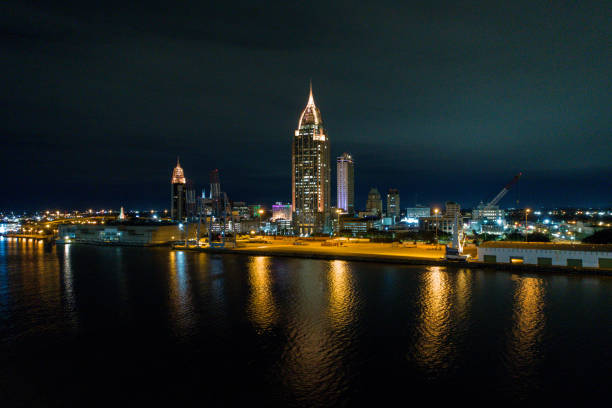 istock Downtown Mobile, Alabama waterfront at night 1197398974