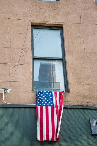 istock American flag in the window 1197401291