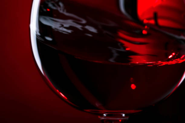 istock Blurred Red wine on red black background, abstract splashing. Macro shot 1197408367