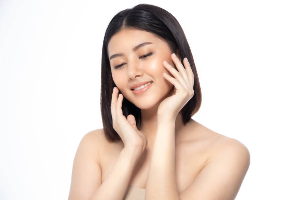 Beautiful Young Asian Woman short hair with Clean Fresh Skin. Face care, Facial treatment, Cosmetology, beauty and healthy skin and cosmetic ideas concept. Beautiful Young Asian Woman short hair with Clean Fresh Skin. Face care, Facial treatment, Cosmetology, beauty and healthy skin and cosmetic ideas concept.