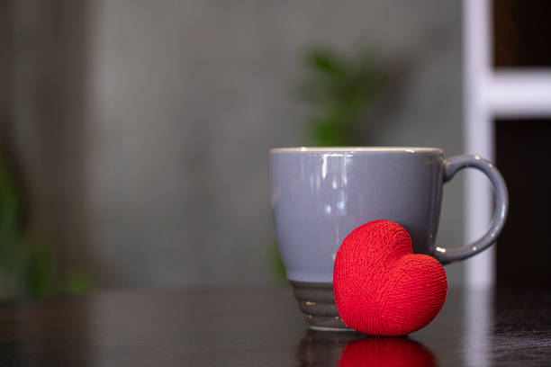 istock ceramic coffee mug and a red heart 1197412639