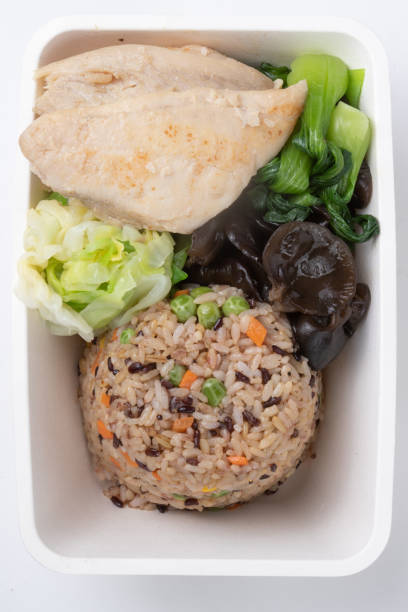 istock Meal prep lunch box containers with baked chicken meat，rice。 1197413588
