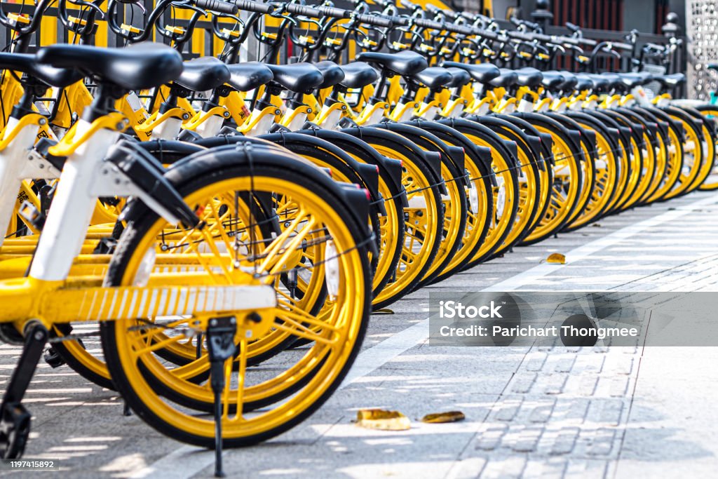December 2019 Guangzhou china rental bikes found along the main street to serve public and connect from area to other. Bicycle parking sign in public park Bicycle Stock Photo