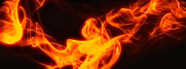 istock Abstract flames floating in the dark 1197421048