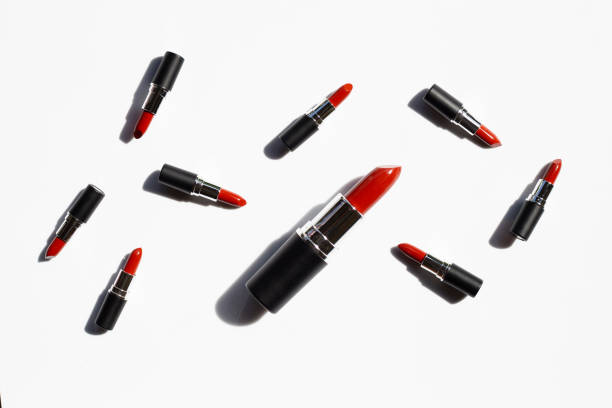 istock Flat lay composition, Lipsticks on white background with shadow. Beautiful Make-up concept 1197428663