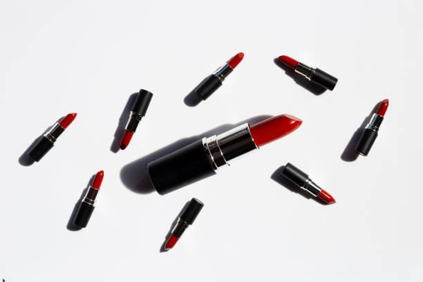 istock Flat lay composition, Lipsticks on white background with shadow. Beautiful Make-up concept 1197428946